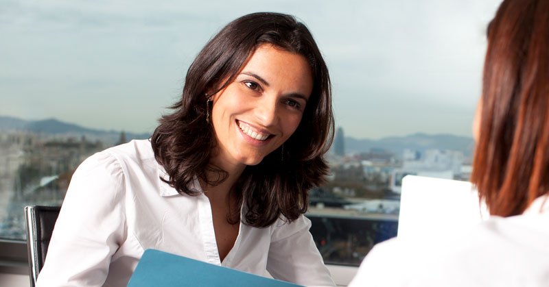 hiring manager conducting job interview with applicant