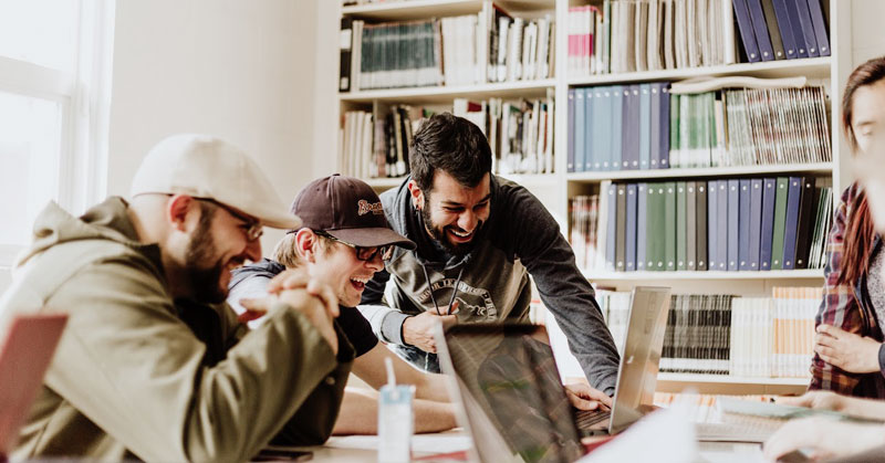 employees laughing together