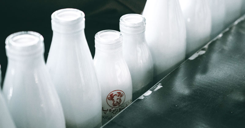 glass milk jars lined up representing boring job ads