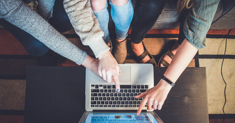 employees looking at hiring process hacks