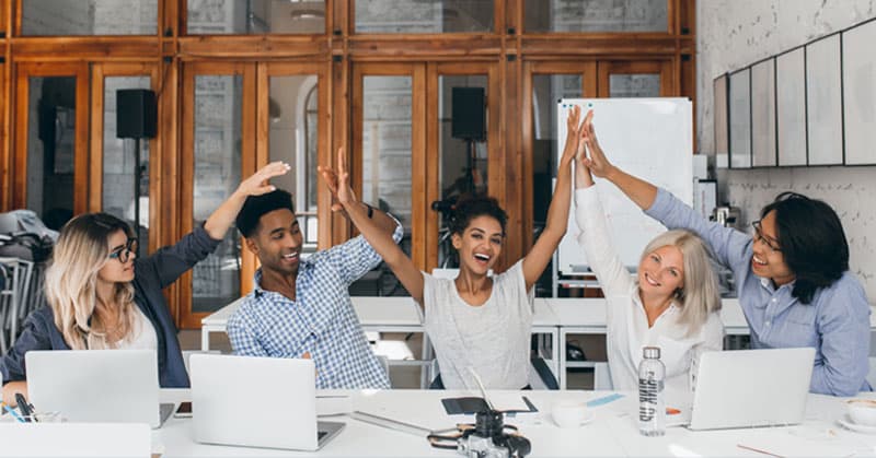 team celebrates attracting top talent