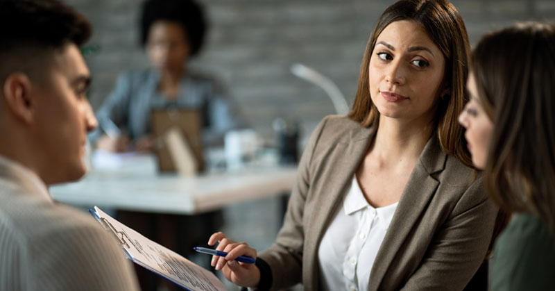 hiring manager teaching employees