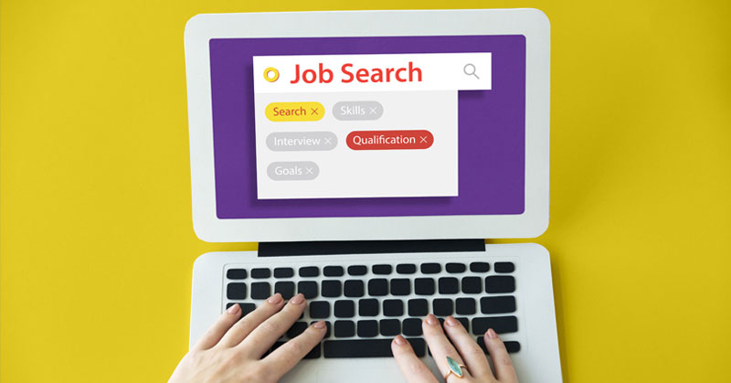 woman searching for job on computer